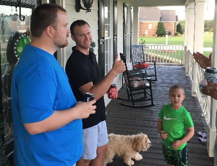 teespring millionaires enjoying a drink on their porch.